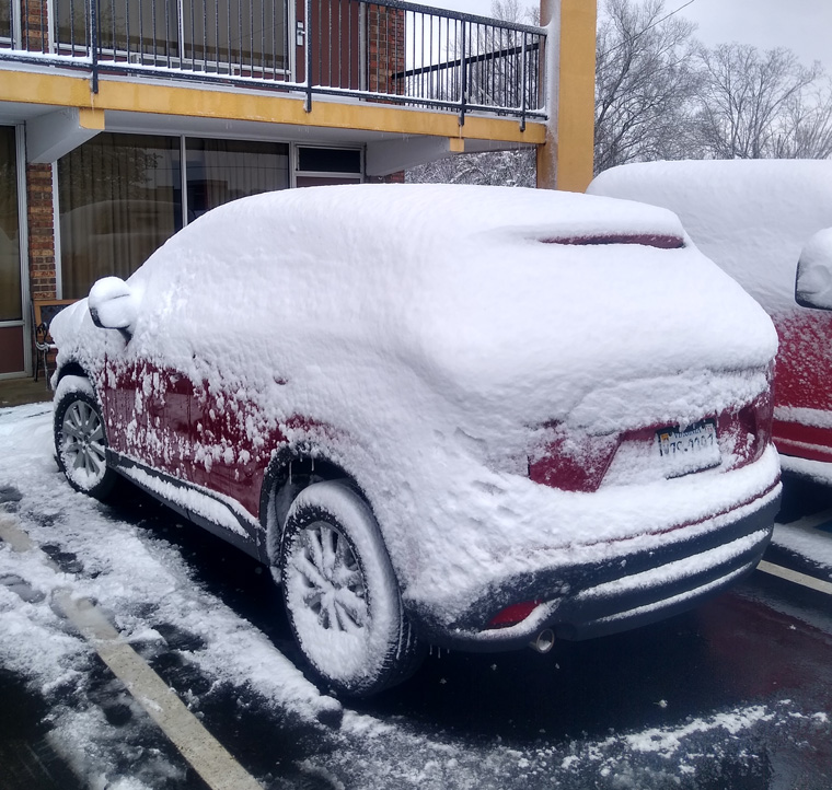 6 inces of snow on my car